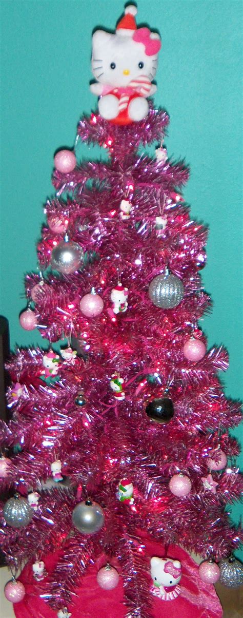 A Pink Christmas Tree With Hello Kitty Decorations