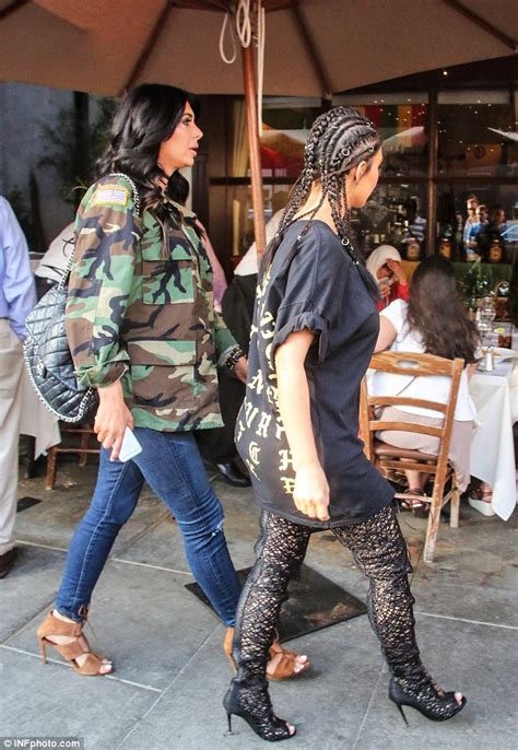 Kim Kardashian Steps Out In Racy Thigh High Lace Up Boots And Cornrows