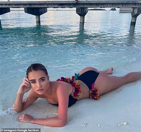 Georgia Harrison Flaunts Her Sun Kissed Figure In Black Flowery Bikini Daily Mail Online