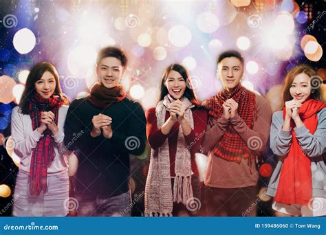 Young Group Celebrating Chinese New Year In Party Stock Photo Image
