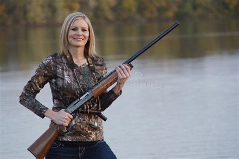 Smiling Female Duck Hunter With Shotgun Stock Photo Image 61751042