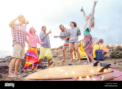 Group Of Young People Having Fun On The Beach Hi Res Stock Photography