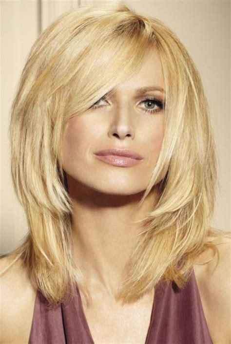 Bangs don't suit everyone, but for people with certain forms of a face. Layered Blonde Hairstyle with Bangs - Hairstyles Weekly