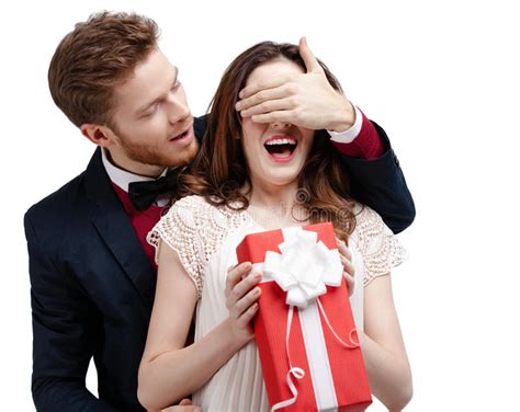 Man Closes Eyes Of His Girlfriend To Give A Present In Red Box Stock Image Image Of Brown