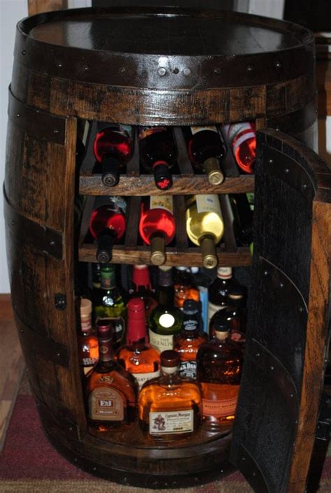 whiskey barrel liquor cabinet w lazy susan and built by barrelworx