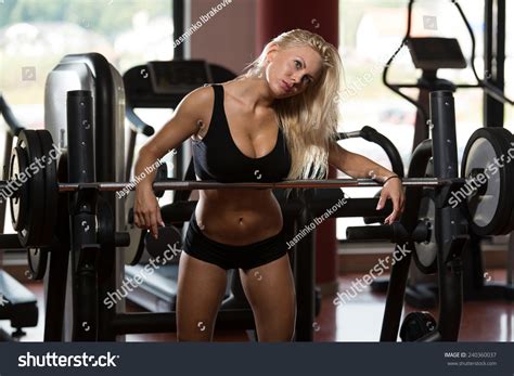 Sexy Blonde Woman Posing Gym 스톡 사진 지금 편집 240360037