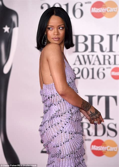 Rihanna Reigns Supereme In Layered Lilac Gown At The Brit Awards 2016