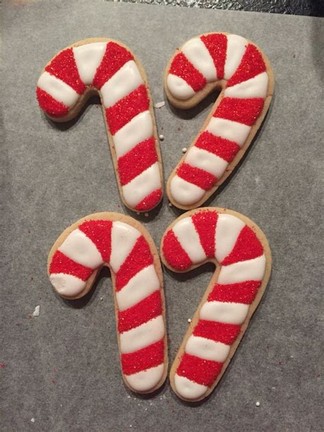 Candy Cane Cookies With Royal Icing And Sprinkles