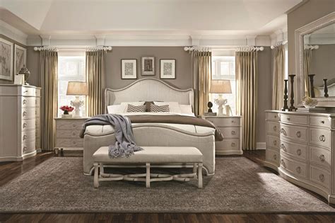 Storage and smart design merge in this chest with an inviting grey finish and brushed nickel hardware. Chateaux Grey Upholstered Shelter Bedroom Set from ART ...