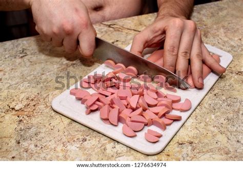 Nude Man Slicing Sausage On White Stock Photo 1276634974 Shutterstock