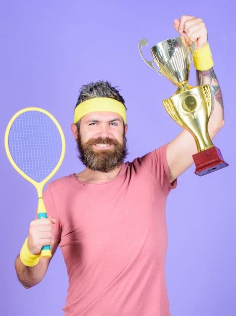 Premium Photo Athlete Hold Tennis Racket And Golden Goblet Man
