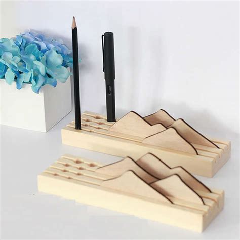 It is a time to organize your desk with this great wooden organizer and keep all your writing utensils in order. Wooden Pen/Pencil Holder with Cell Phone Stand for Desk ...