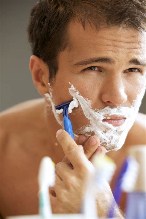 Close Up Of A Young Man Shaving His Face Stock Photo Image Of
