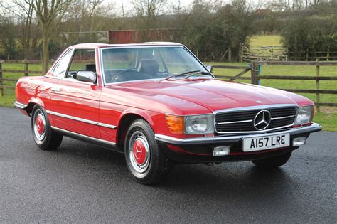 This car is finished in signal red with cream beige. 1974 Mercedes R107 - Partsopen