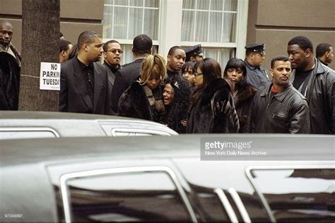 935 Kday Lil Kim At Biggies Funeral Being Consoled By