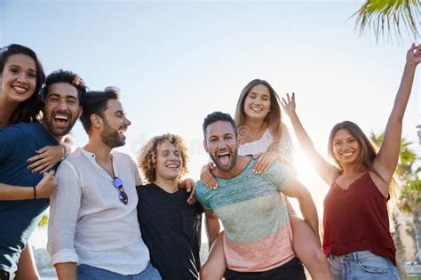 Group Of Young People Laughing Together Outside Stock Image Image Of