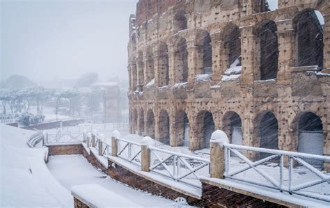 Snow In Rome The Colosseum In The Morning While Snowing Winter In New