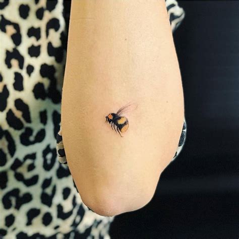 Honey Bee Tattoo On The Left Forearm