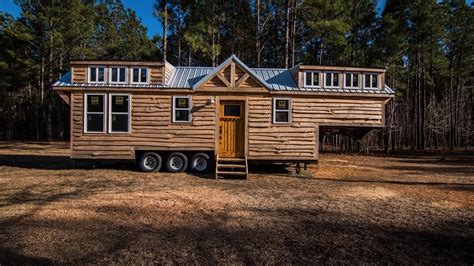 Live a free life in a sustainable manner filled with joy! 39ft Rustic Gooseneck Tiny House on Wheels