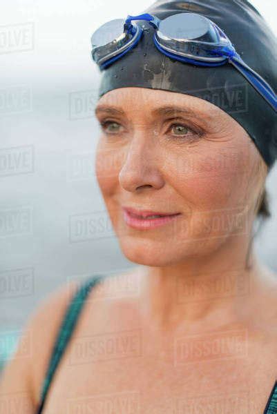 Caucasian Swimmer Wearing Goggles And Swimming Cap Stock Photo Dissolve