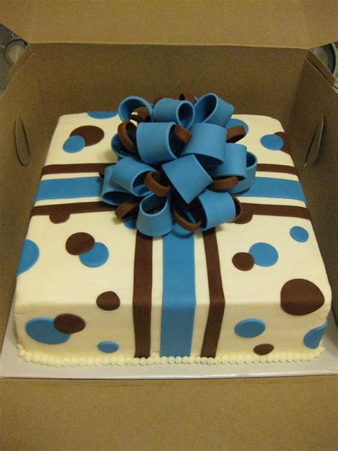Buy him his favourite bottle of alcohol and stick small chocolates all around the body of the bottle. present.jpg (image) | Present cake, Birthday cake for men ...