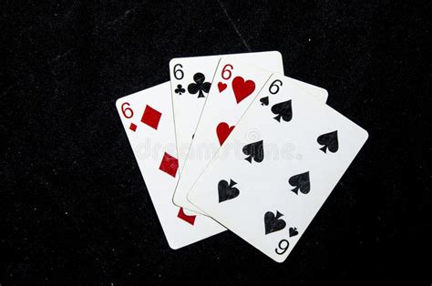 Four Playing Card S Fanned Out All Sixes Stock Photo Image Of Hart