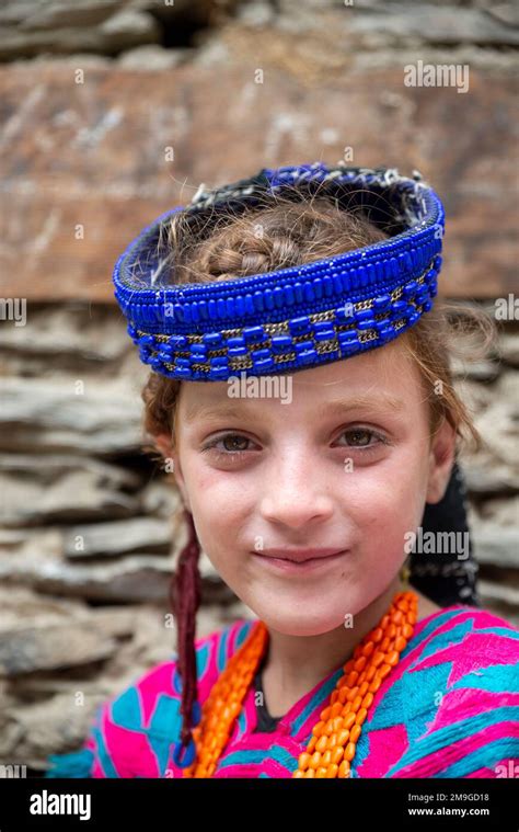 Close Up Portrait Of A Young Kalash Girl Wearing Traditional Clothes