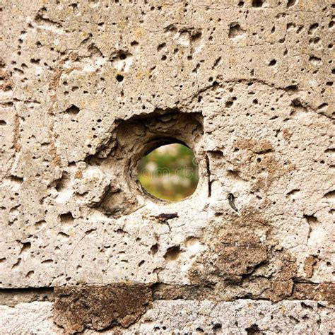 Hole In The Destruction Concrete Wall Bullet Hole Abstract Background