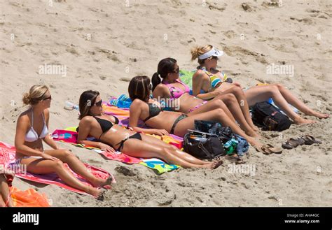 Women Sunbathing Huntington Beach Ca Usa Stock Photo Alamy