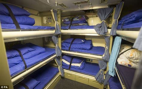A Royal Navy Submarine Cabin Pictured Is Cramped With Nine Bunks
