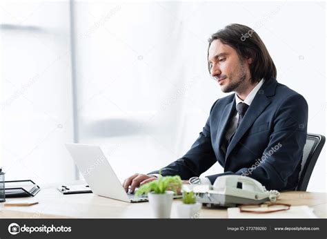 Handsome Businessman Sitting Office Using Laptop — Stock Photo