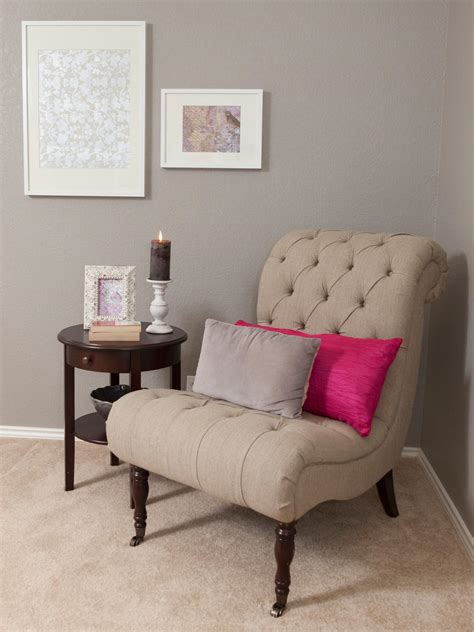 If your bedroom could use a little pop of color, the hudson accent chair is the perfect place to start. Gray Bedroom Sitting Area With Tufted Chair | HGTV