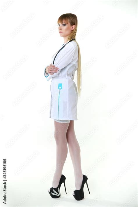 Sexy Woman Doctor With A Stethoscope Standing On White Background Sexy