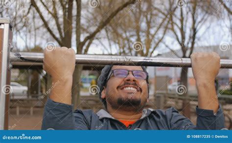 Street Workout Training For Beginners Close Up Shot Of Chubby Hispanic