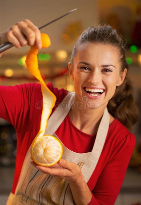 Smiling Young Housewife Removing Orange Peel Stock Photo Image Of