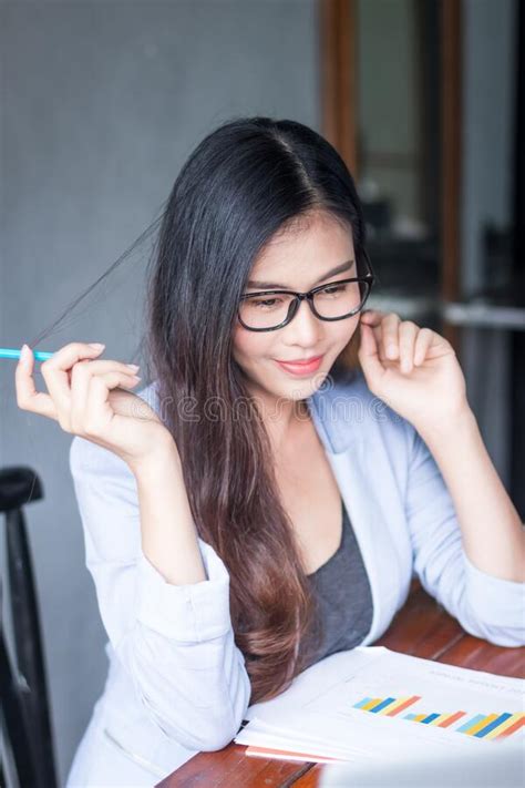 Business Women Wear Glasses Beautiful Asians Have Fun In The Office