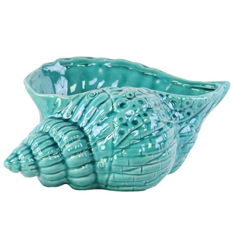 This Turquoise Conch Seashell Figurine Is A Great Addition To Any