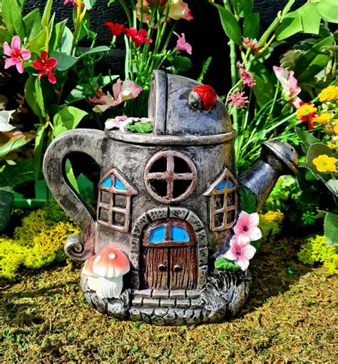4.8 out of 5 stars 391. Secret Garden Solar Watering Can House - Fairy Gardens UK