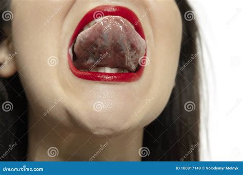 Smiling Girl Opening Her Mouth With Red Lips And Showing The Long Big