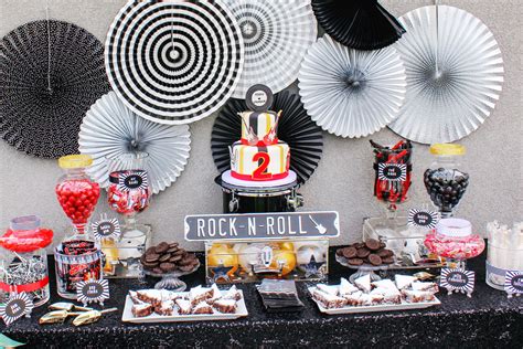 Find fun partyware and musical decorations for your next celebration at the music stand. A Rock N' Roll Party for Graham's 2nd Birthday | Holidays & Parties | Rock, roll birthday, Candy ...