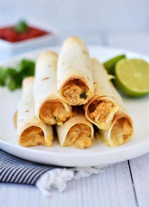 Baked Chicken Taquitos Are A Crispy Flour Tortilla Wrapped Around A