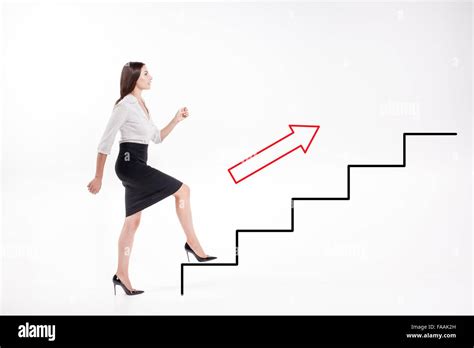 Young Businesswoman Walking Up On Stairs Stock Photo Alamy