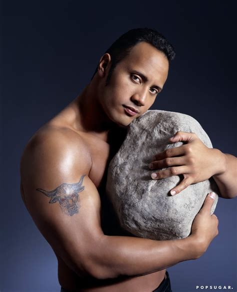 Dwayne Johnson Posing With A Rock Photos Popsugar Celebrity
