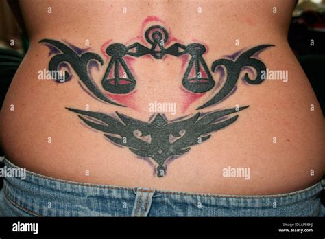 Female Lower Back Tattoo Stock Photo Alamy