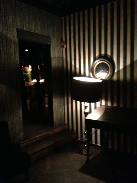 A bar that offers large armchairs, great atmosphere and caring staff for a low price. Neue Odessa Bar | Wall lights, Odessa, Bar