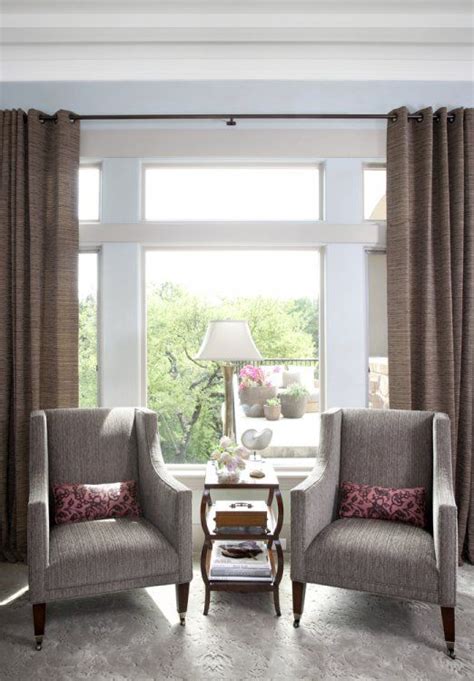 Here are a few ideas for a covered, front porch in the uk, with a number of size and style considerations. pair of chairs & small table in front of large window ...