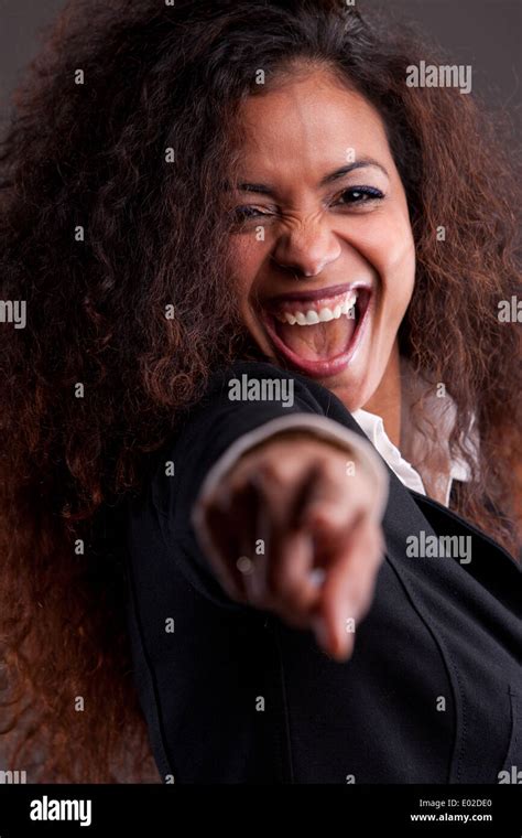 Beautiful Smiling Woman Pointing Finger Stock Photo Alamy