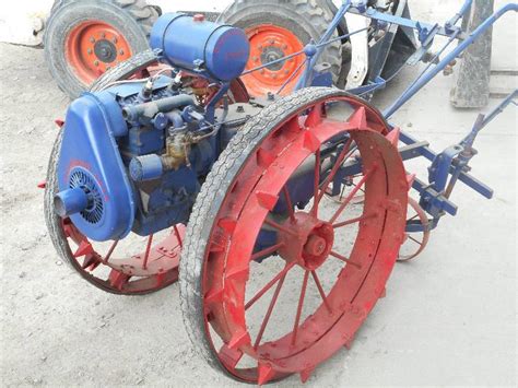 Electric walk behind tractor working around my property, doing everything from hauling dirt and gravel too firewood and plowing snow. Rare Find: Antique Standard-Twin Walk-Behind Tractor | LE ...
