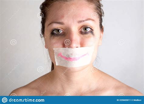Unhappy Woman With Wrapping Her Mouth By Adhesive Tape Painted Smile