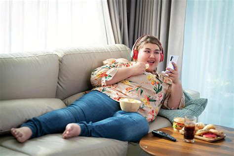 Asian Fat Enjoy Eating A Fat Food Photograph By Anek Suwannaphoom Fine Art America